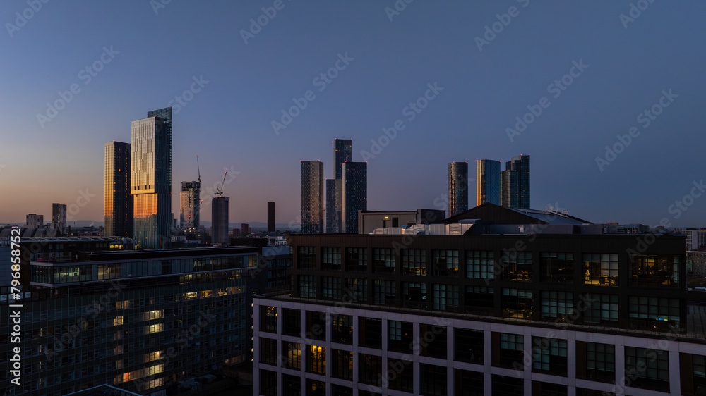 Twilight cityscape with illuminated Buildings Twilight cityscape with illuminated Buildings