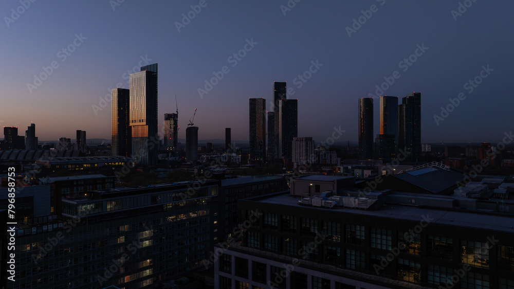 Morning Breaks over Manchester skyline of high-rise buildings