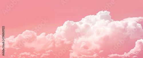 Pink and white clouds on pink sky reminiscent of cotton candy. Abstract background for banner, poster design or childrens room decor