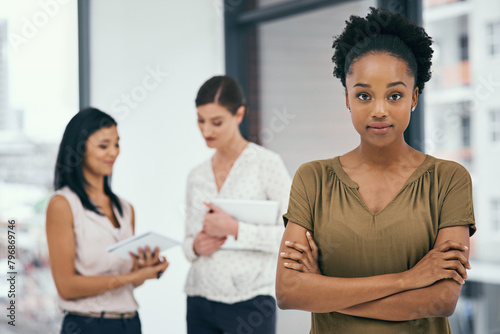 Internship, portrait and black woman with arms crossed in office for training, onboarding or new job opportunity. Business, creative career and female employees for teamwork, support or confidence