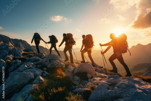 Group of friends hiking climbing mountain adventure nature recreation. photo