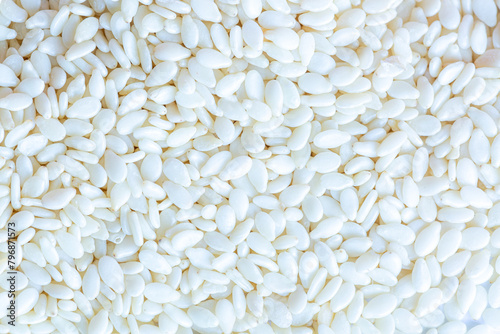 macro sesame seed texture,Close-up of white sesame seeds,Raw hulled white Sesame seeds, close-up.