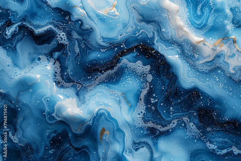 The stunning abstract features the swirling dance of blue currents accented with white and gold The stunning abstract features the swirling dance of blue currents accented with white and gold