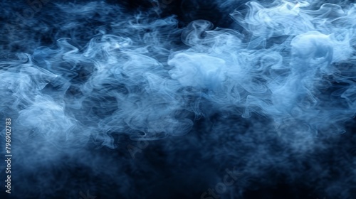   A substantial amount of smoke against a backdrop of absolute blackness  with a gentle light blue tint to the left side