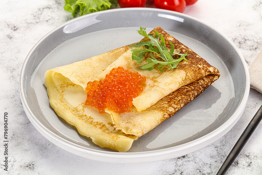 Russian pancake with red caviar
