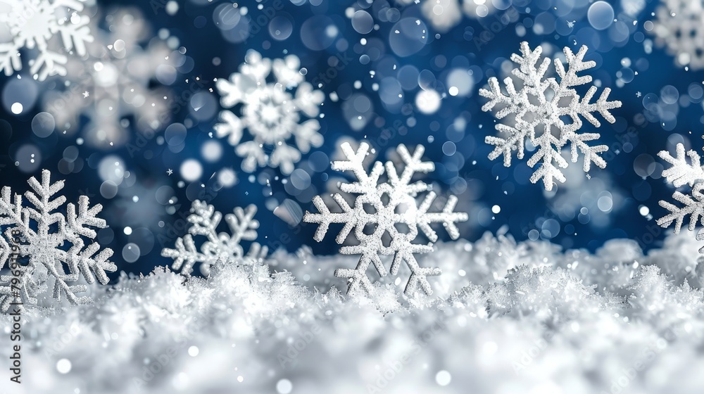 Close-up of snowflakes against a blue backdrop Snowflakes prominent in the foreground, while background features softly blurred snowflakes Close-up of snowflakes against a blue backdrop Snowflakes prominent in the foreground, while background features softly blurred snowflakes