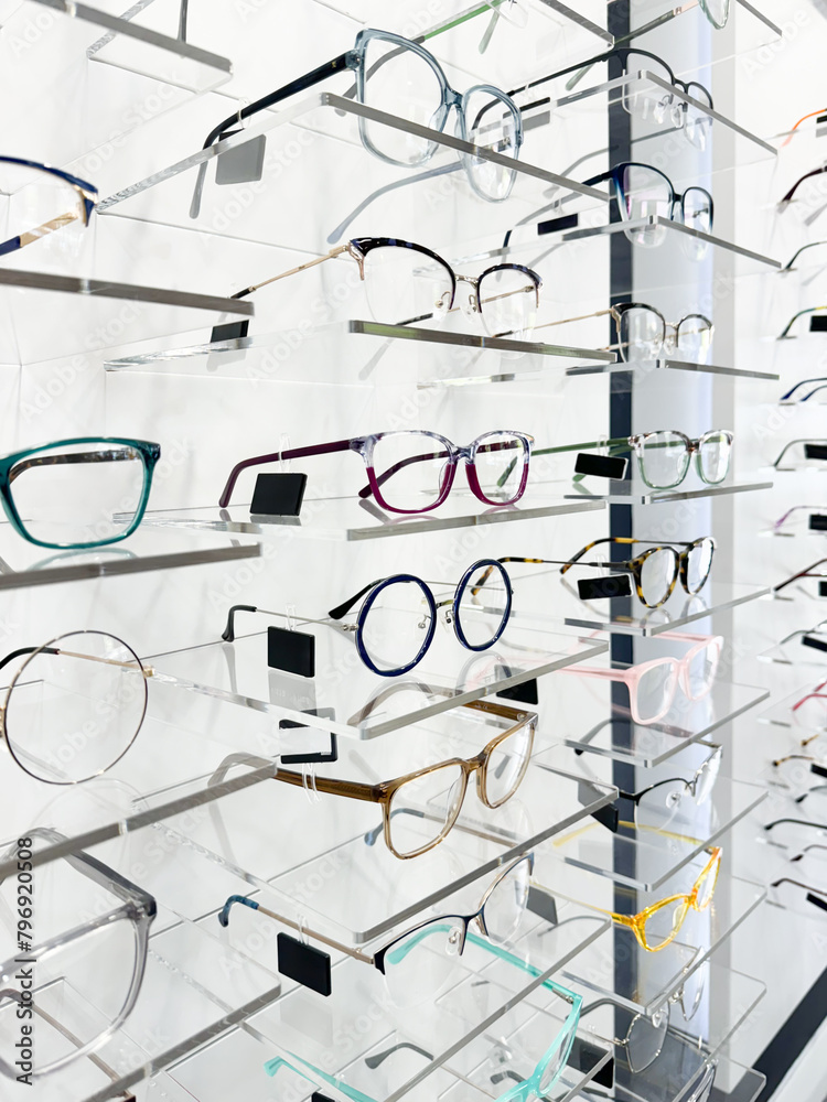 display full of glasses of all kinds and models in the opticians' shop display full of glasses of all kinds and models in the opticians' shop