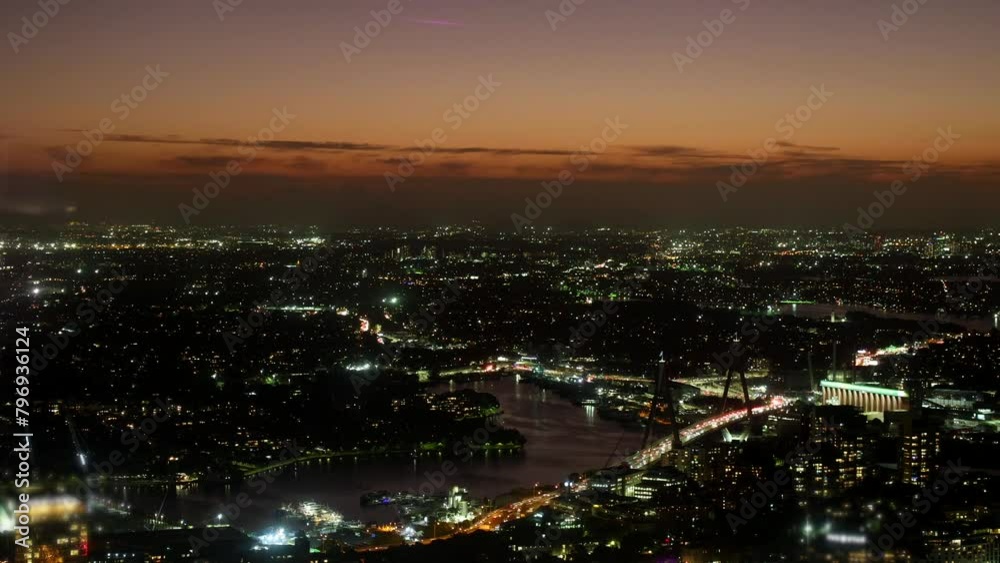 Sydney skyline overlooking the Harbour Bridge, Australia during sunset. Sydney skyline overlooking the Harbour Bridge, Australia during sunset.
