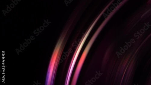 abstract color range effects of a film projector close up with  reel spool turning with super 8mm running detail shot isolated on black background warm red light shining through colour light spectrum