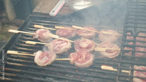 Meat rolls on the grill. Barbecue.