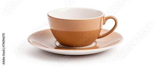Cup and saucer on white surface photo