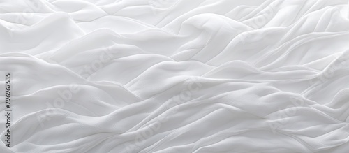White bed with crisp sheet close-up photo