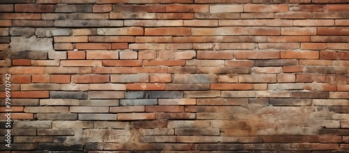 Close-up of textured red brick wall with numerous bricks