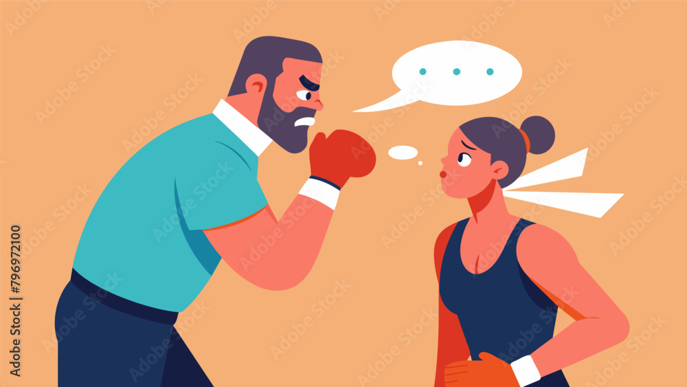 A trainer instructs their fighter to focus on their breath reminding them that controlled breathing can help them stay calm and focused in the A trainer instructs their fighter to focus on their breath reminding them that controlled breathing can help them stay calm and focused in the