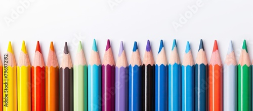 Colored pencil lineup with a single one at the center