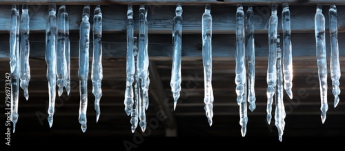 Icicles hang roof dark room
