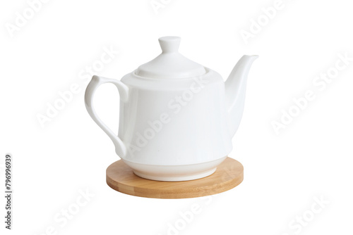 White ceramic kettle on wooden stand on white background