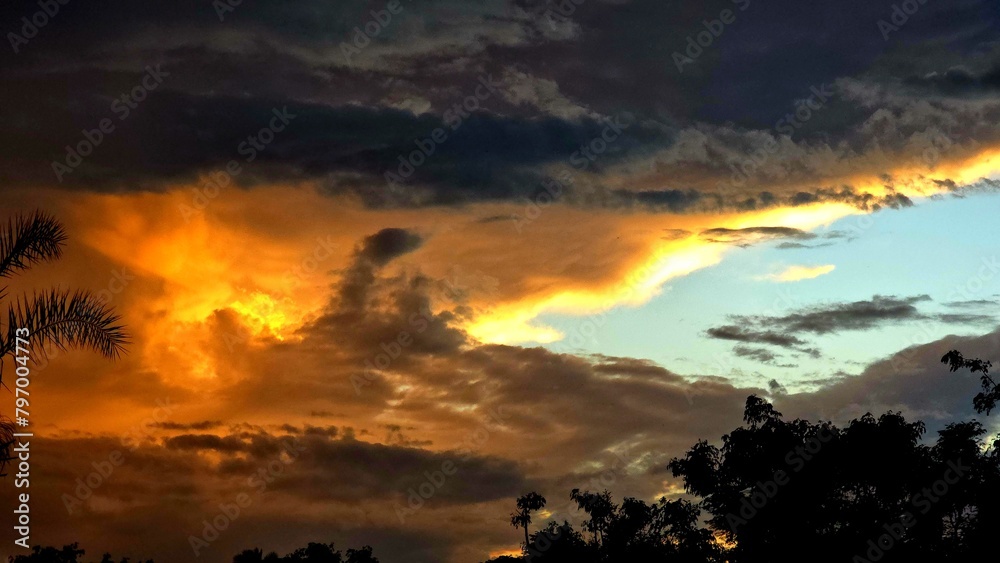Gold cloud in sky at sunset in the sky video 4K. Nature video High quality footage. 
Scene of Colorful romantic sky sunset with orange color of the sky background.