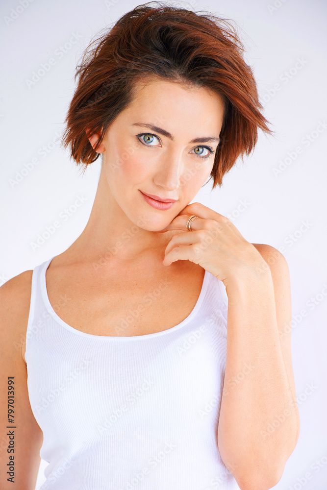 Woman, studio and portrait with fashion, smile and confidence for trendy style. Model, elegance and proud with funky, cool and positive look with tank top and happiness isolated on white background Woman, studio and portrait with fashion, smile and confidence for trendy style. Model, elegance and proud with funky, cool and positive look with tank top and happiness isolated on white background