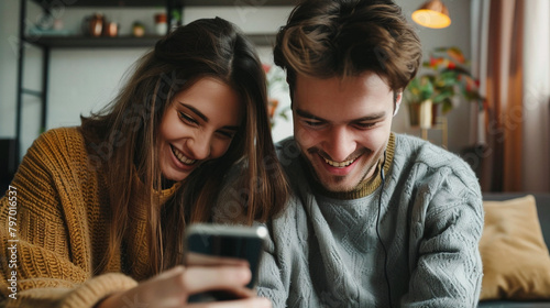 Young Couple Making A Video Call On Smartphone, Smiling And Happy, Using Mobile Internet Connection For Online Communication