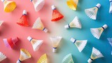 A colorful array of badminton shuttlecocks on a dual-toned background