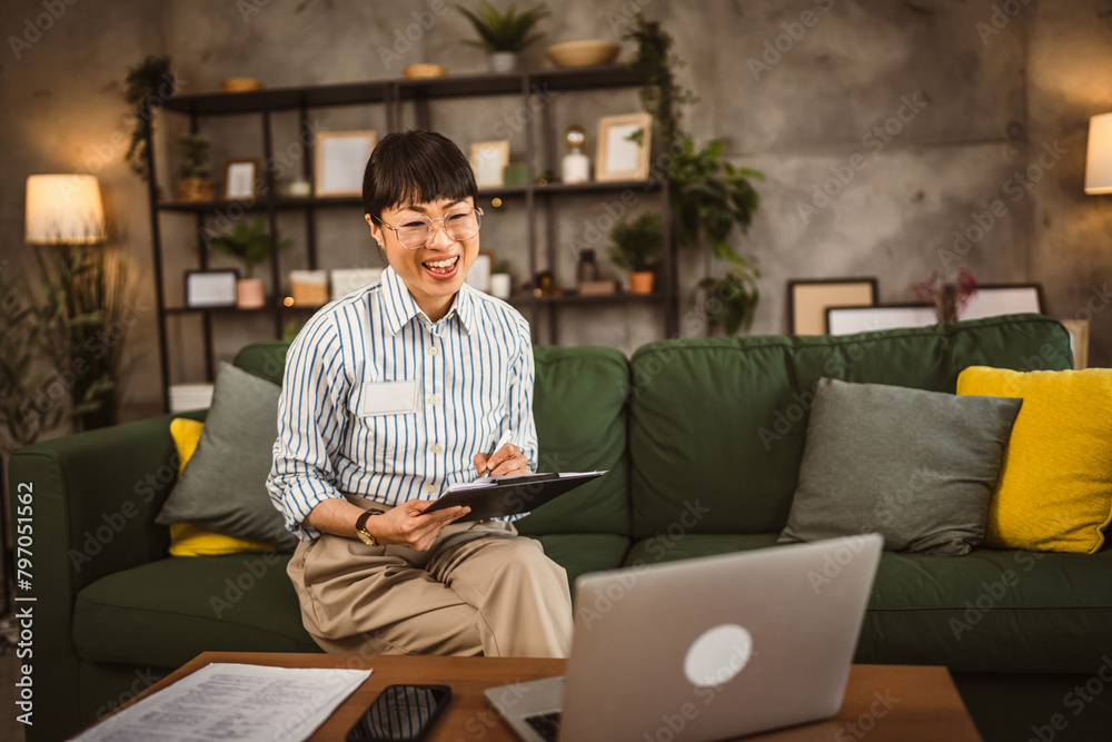 Mature japanese woman have consultation via video call work from home Mature japanese woman have consultation via video call work from home