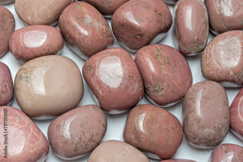 Pink Rhodonite tumbled gemstones macro