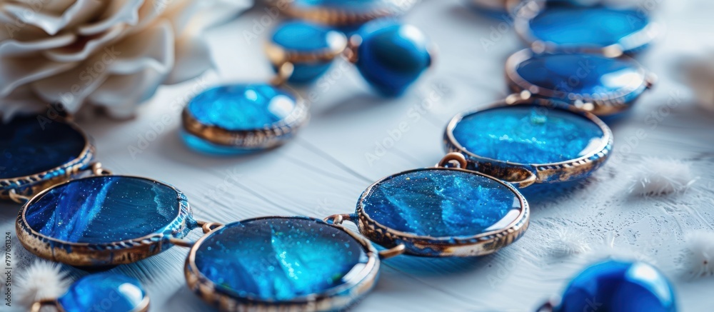Detailed Close Up of Azure and Ele Necklace on Table Detailed Close Up of Azure and Ele Necklace on Table