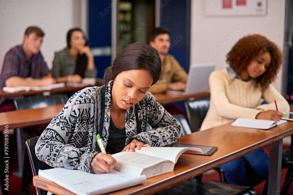 College, studying and girl with writing in classroom for education, scholarship and development. Campus, paper and student with textbook at academy for future, learning and knowledge in university College, studying and girl with writing in classroom for education, scholarship and development. Campus, paper and student with textbook at academy for future, learning and knowledge in university