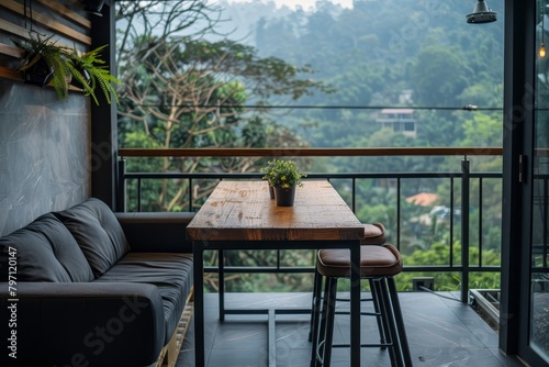 Cozy balcony seating area overlooking lush green forest