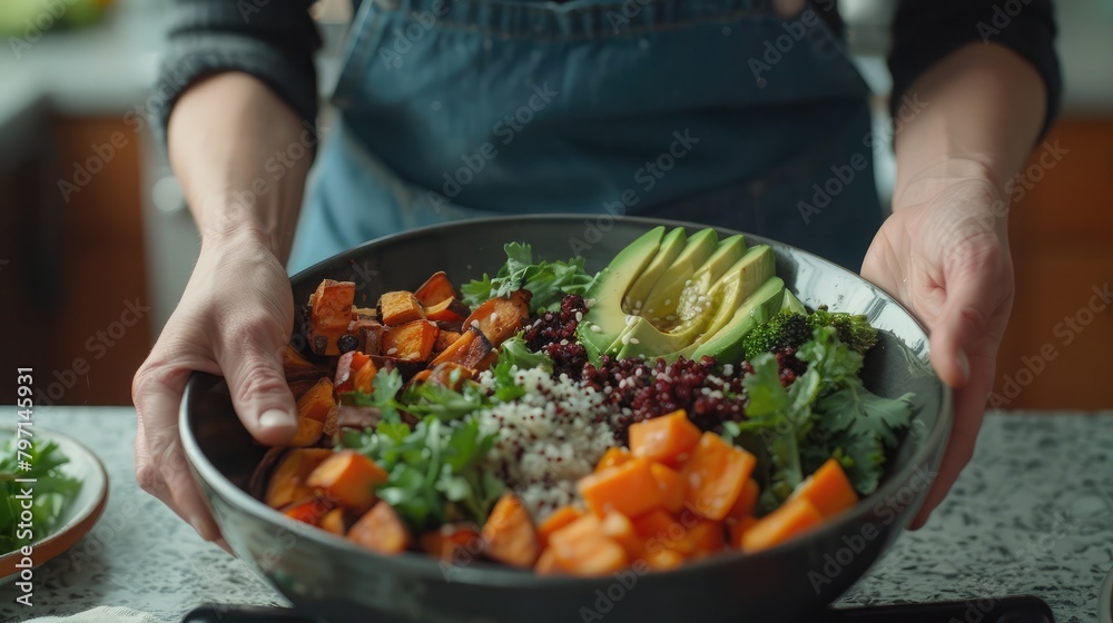 woman preparing a colorful Buddha bowl with quinoa, roasted sweet potatoes, and avocado, celebrating the nourishing qualities of superfoods.