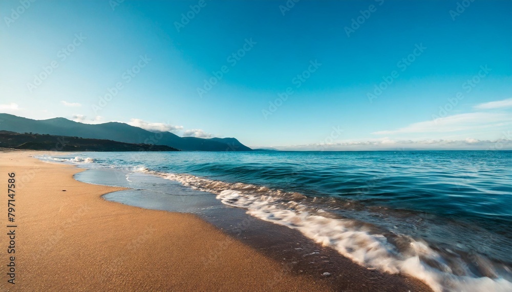 a tranquil beach with water arriving onshore