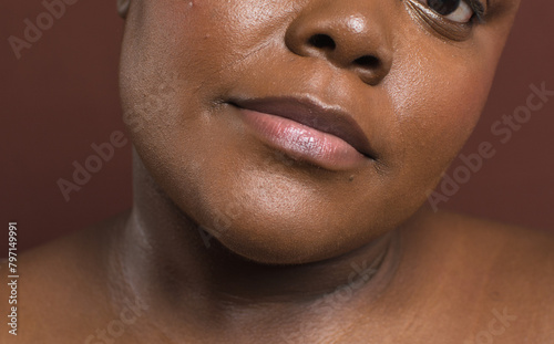 Slika na platnu Brown skin woman with even skin tone, dark skin woman with foundation applied on