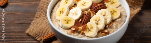 A comforting bowl of oatmeal made with glutenfree oats and almond milk, topped with sliced bananas and cinnamon for a soft beige, safe breakfast option