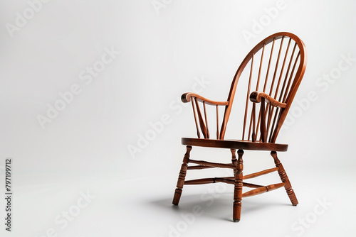 An attention-to-detail Windsor chair portrayed on a white background  isolated on solid white background.