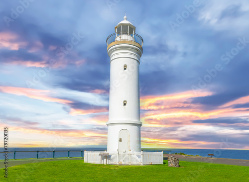 Beautiful lighthouse at Sunset over the Pacific Ocean on cliffs of Kiama Sydney NSW Australia Coastal Beach fishing Town