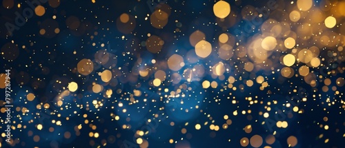 Abstract background with dark blue and gold particles, golden Christmas light particles shine bokeh on a dark blue background, gold foil texture concept.