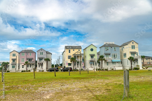 Modern urban townhomes by the ocean in North Carolina. Residential buildings with several floors.