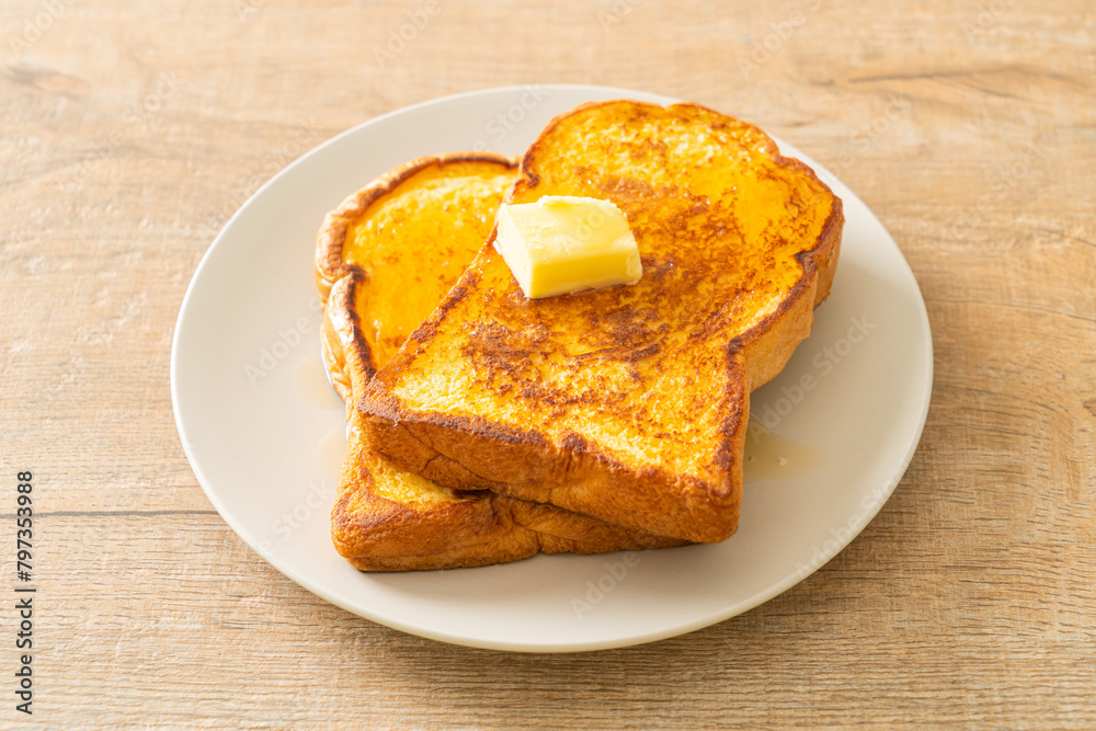 French toasted with butter and honey