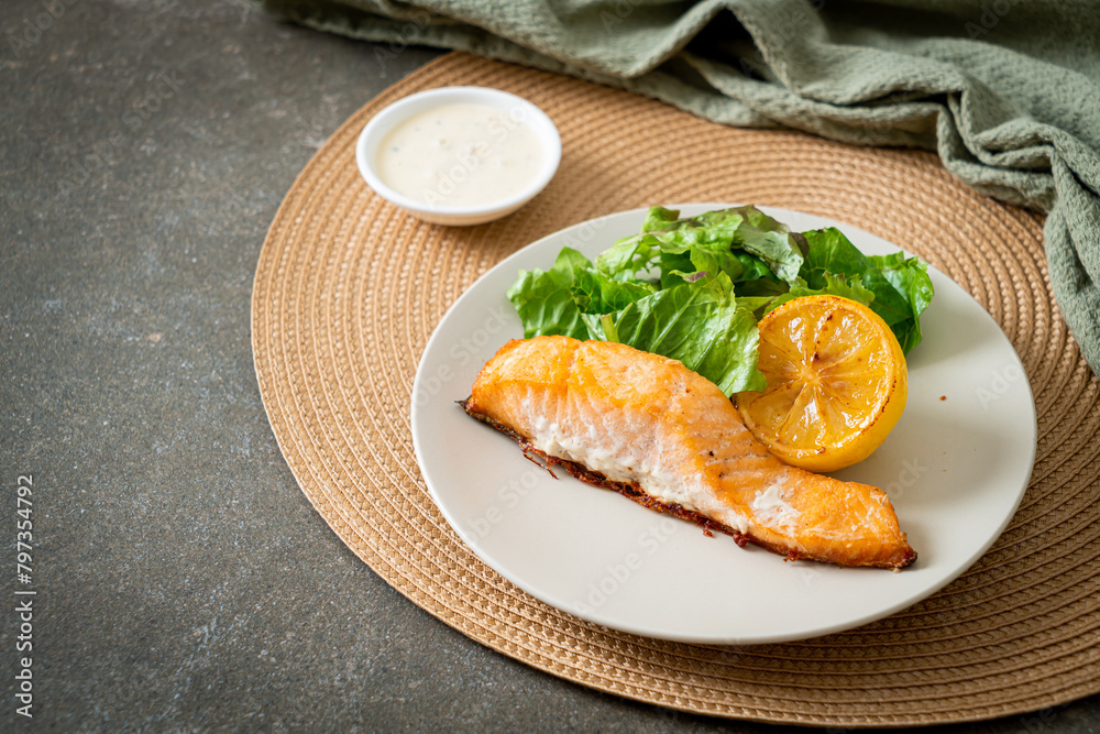fried salmon steak with lemon and vegetable fried salmon steak with lemon and vegetable