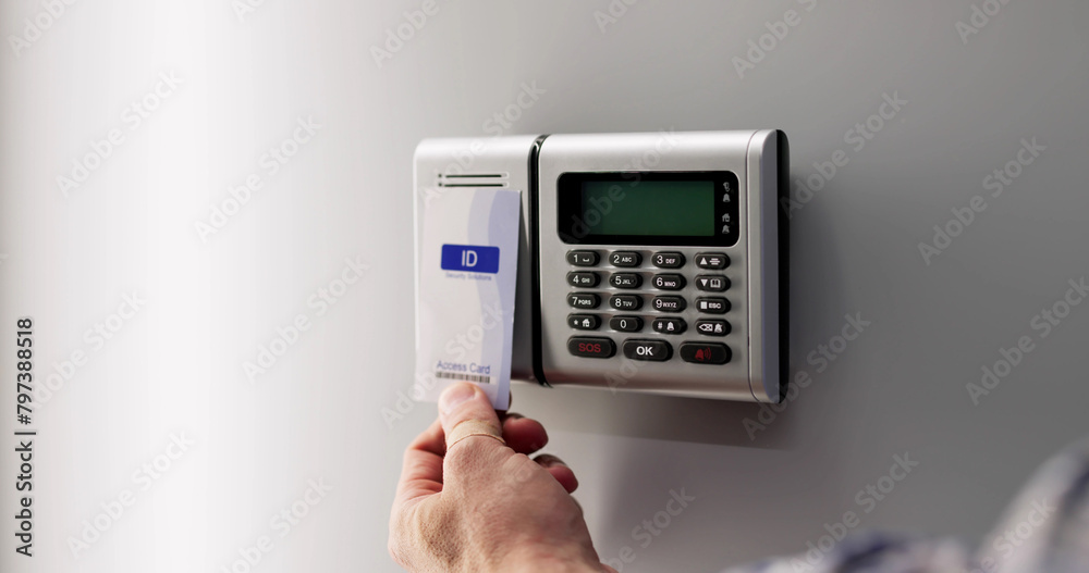 Person's Hand Holding Access Card To Lock Person's Hand Holding Access Card To Lock
