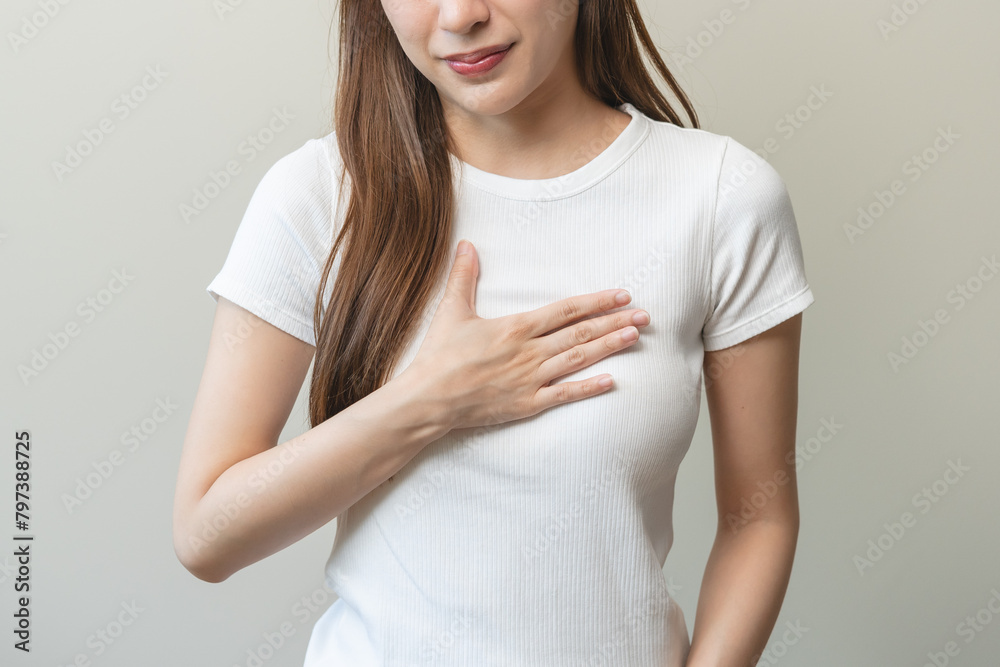 Acid reflux disease, suffer asian young woman have symptom gastroesophageal, esophageal, stomach ache and heartburn pain hand on chest from digestion problem after eat food Acid reflux disease, suffer asian young woman have symptom gastroesophageal, esophageal, stomach ache and heartburn pain hand on chest from digestion problem after eat food