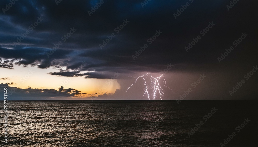 lightning over the city, Bright lightning strikes the ground at night. Stormy sky with multiple lightning from the clouds over the sea against the backdrop of the night city