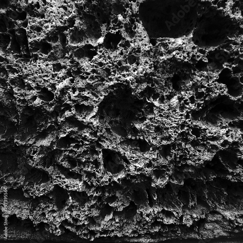 amazing structure of porous rock found on the ground © photoidea