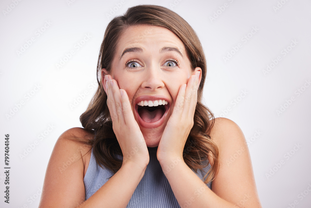 Woman, excited and portrait with expression in studio for reaction or secret or announcement. Young lady, happy or wow gesture isolated for emoji, sale or rumor for crazy drama with excitement Woman, excited and portrait with expression in studio for reaction or secret or announcement. Young lady, happy or wow gesture isolated for emoji, sale or rumor for crazy drama with excitement
