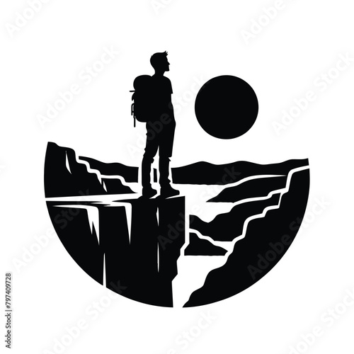 silhouette of a hiker admiring the view from a cliff edge