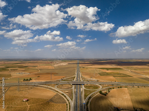 Aerial view of the intersection between the A-4 and A-43 highways near Manzanares, in the La Mancha region (Ciudad Real, Castilla La Mancha, Spain) photo