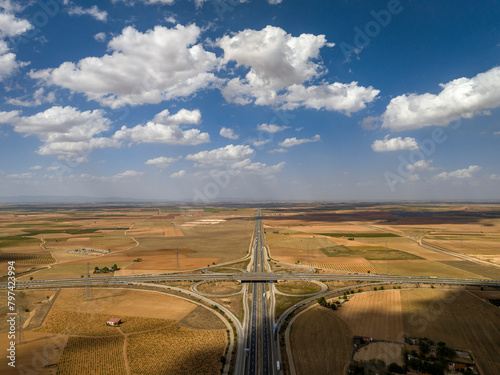 Aerial view of the intersection between the A-4 and A-43 highways near Manzanares, in the La Mancha region (Ciudad Real, Castilla La Mancha, Spain)
