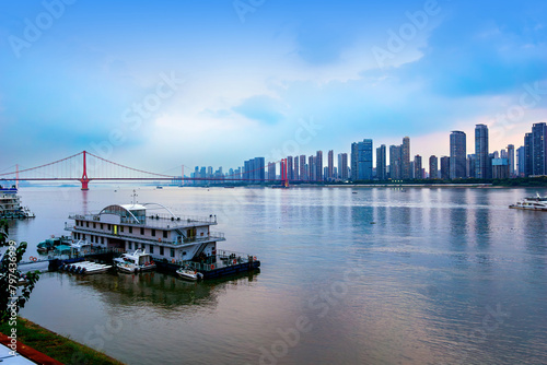 Yangtze River Bridge and skyscrapers along the river, night view of Wuhan, China.