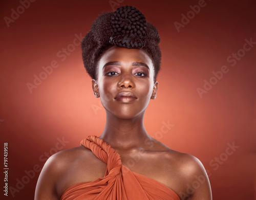 Portrait, makeup and skincare of confident black woman in studio for wellness, beauty or aesthetic isolated on red background. Face, fashion and cosmetics of serious African model for shine or glow